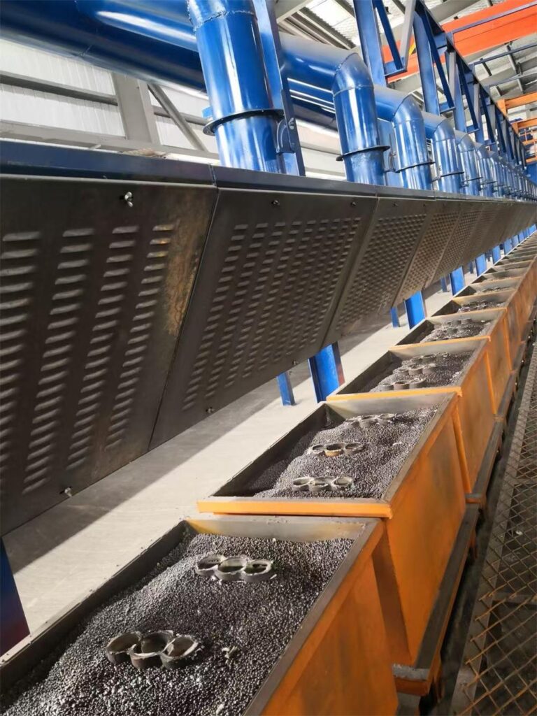 Tumble belt shot blasting line for removing sand and oxide layer from casting parts