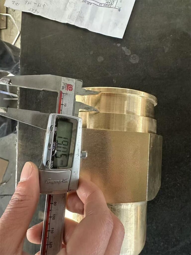 Shoulder height inspection of machined bronze valve stem retainer nut