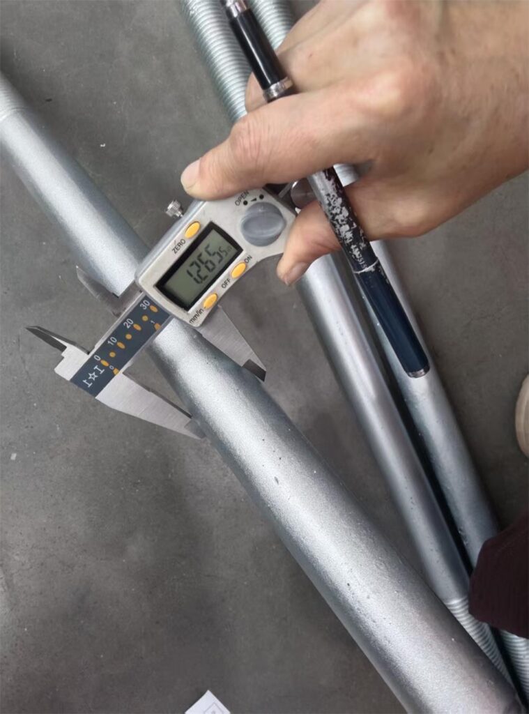 Diameter inspection of zinc plated alloy steel adjusting spindle