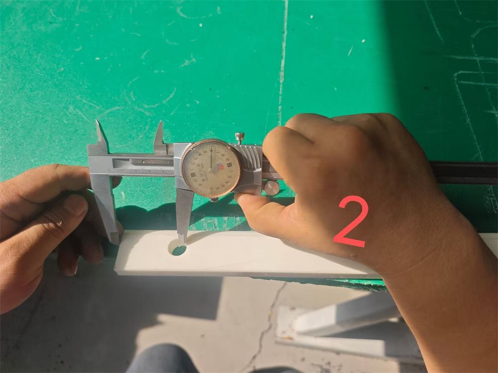 Hole position inspection of custom UHMWPE seal retainer
