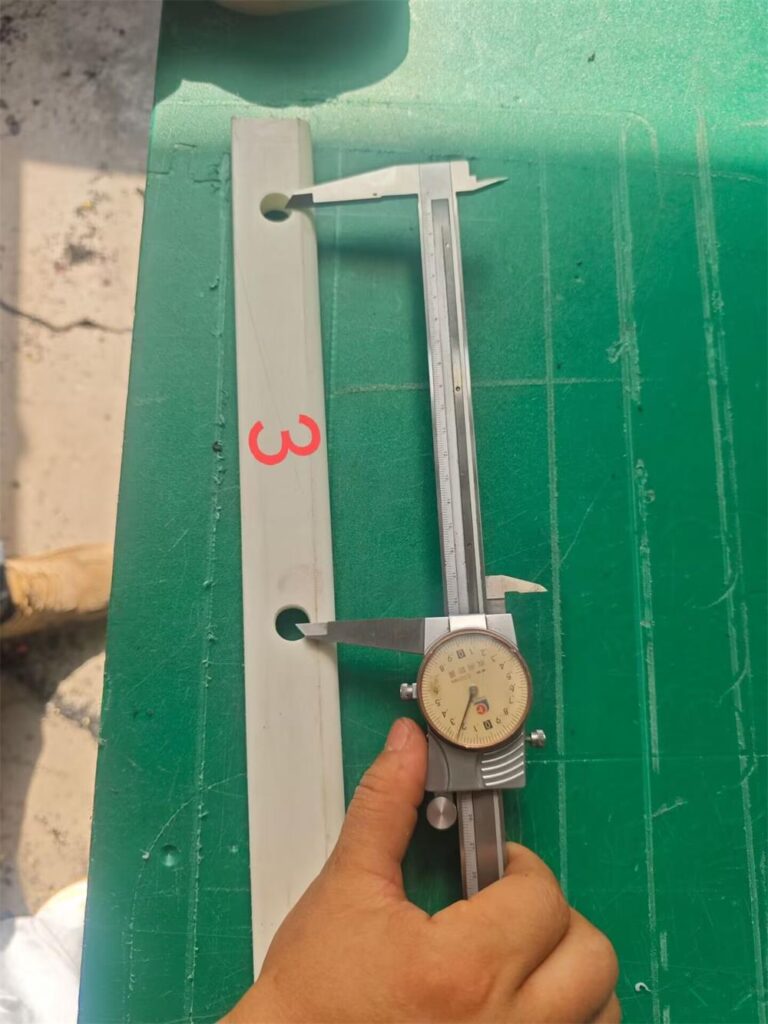 Hole spacing inspection of UHMWPE seal retainer