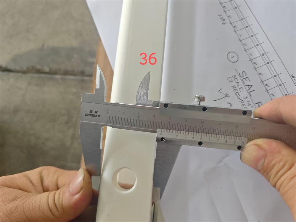 Profile width inspection of UHMWPE machined strip
