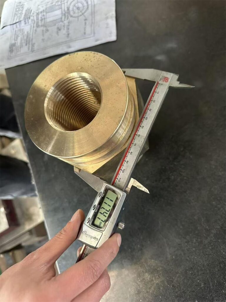 Top outside diameter inspection of UNS C92200 bronze retainer nut
