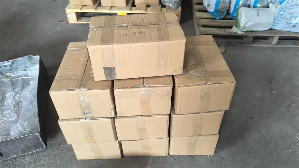 Carton packed cable tab kits ready for LCL shipment to Australia