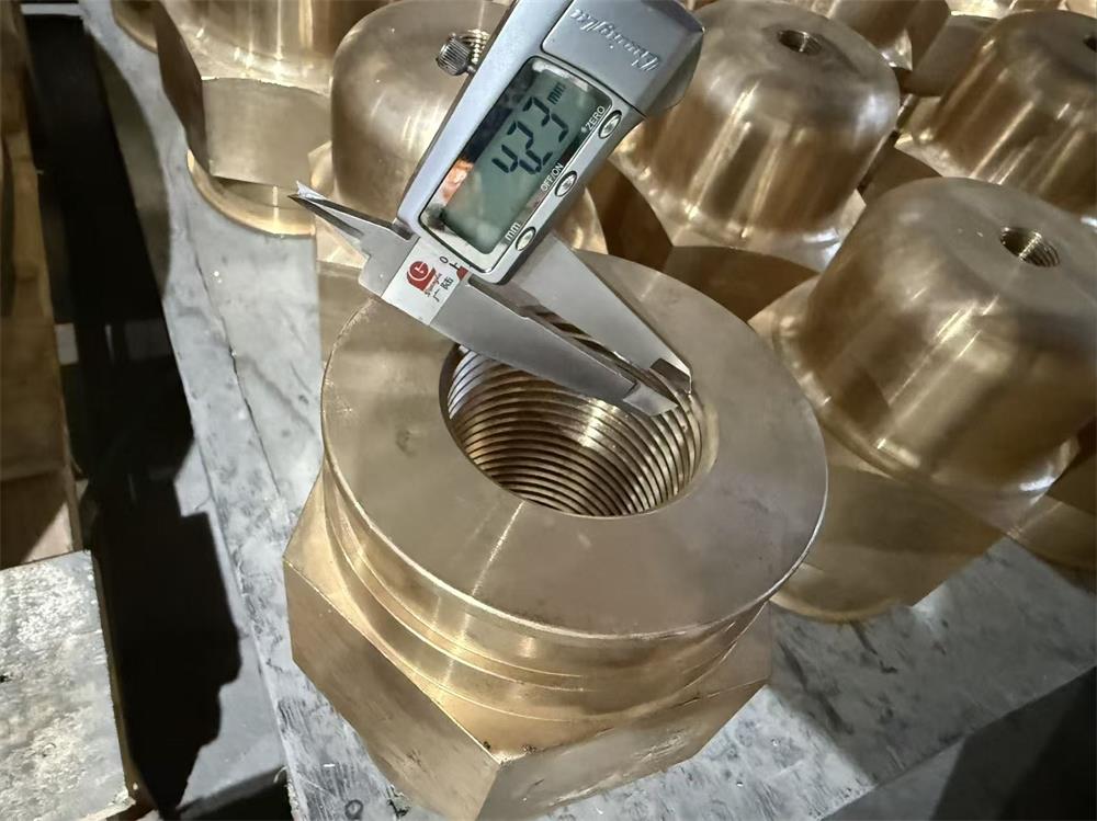 Centrifugal cast UNS C92200 bronze valve stem lower retainer nut with dimensional inspection
