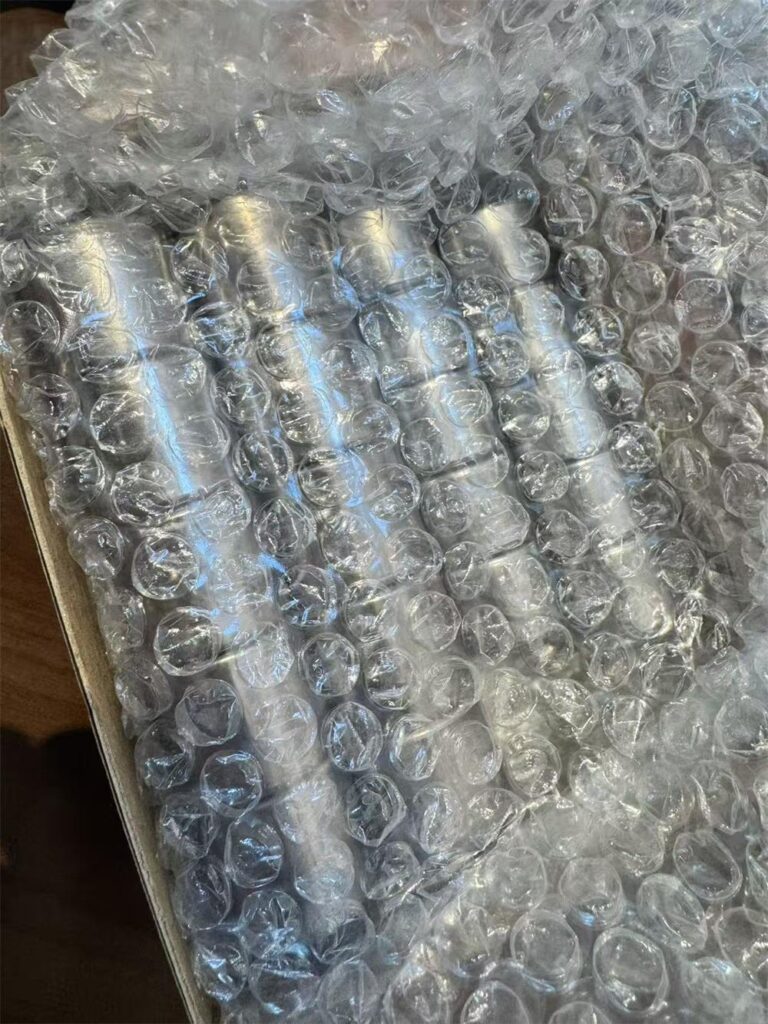 Custom 7/8 and 3/4 needle bearing samples packed in plastic bag