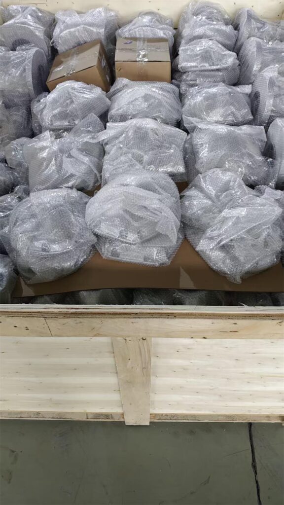 bubble wrapped aluminum casting parts packed in wooden crate