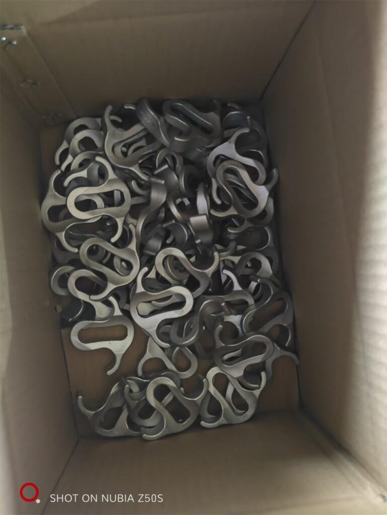 Silica sol cast stainless steel finger grips for safety spring assembly