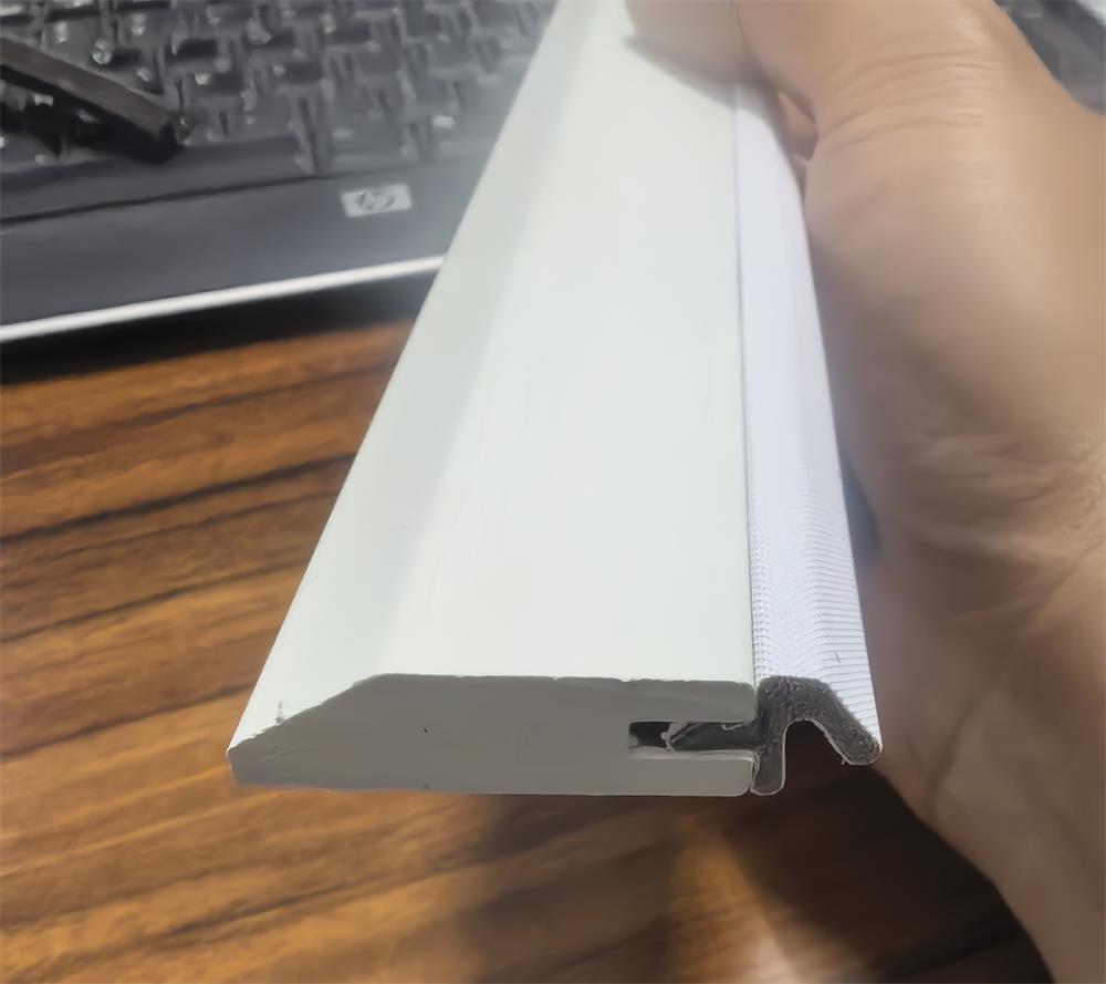 White rigid PVC bead seal profile combined with soft PVC V-seal