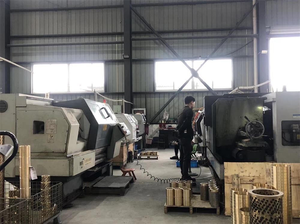 CNC machining workshop for custom bronze bushings and copper alloy parts