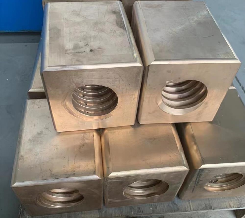 Custom copper alloy blocks with precision machined internal threads