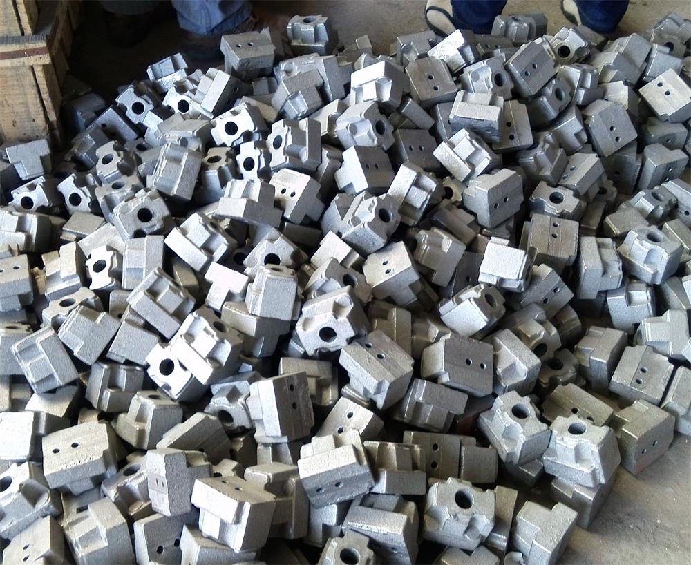 Large batch of hydraulic valve body castings prepared for machining
