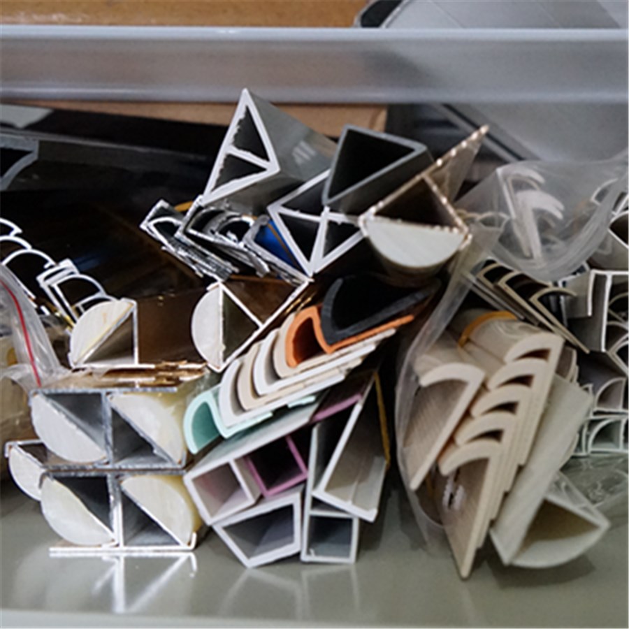 Open channel angle trim and general-purpose custom PVC extrusion profiles
