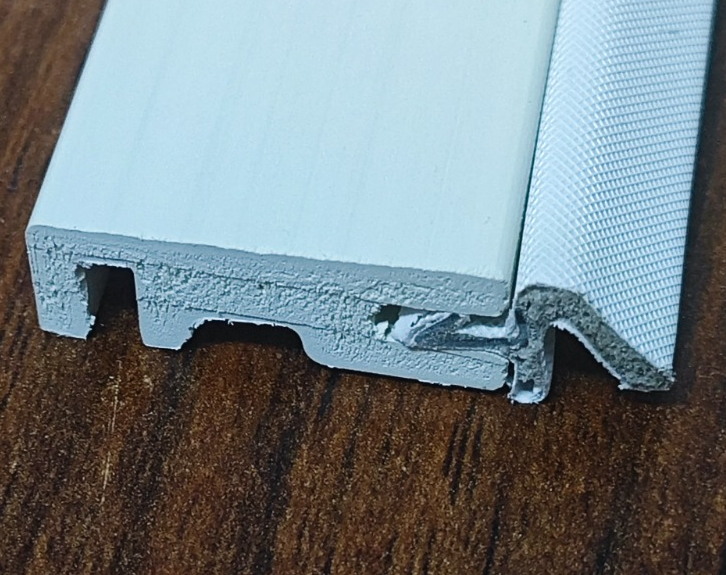 Rigid PVC profile with separately extruded soft sealing insert