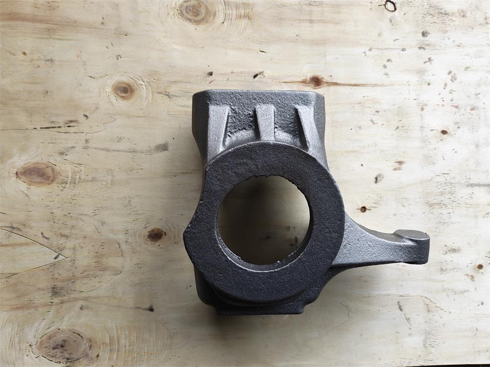Side view of a custom SG500-7 ductile iron knuckle casting